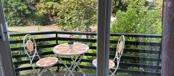 At a serene location opposite to the house of a double Nobel laureate