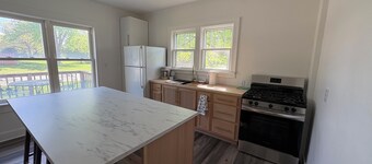 Charming 1900 home with furnished kitchen and king bed