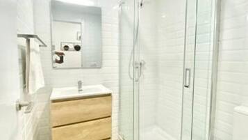 Hair dryer, bidet, towels, soap