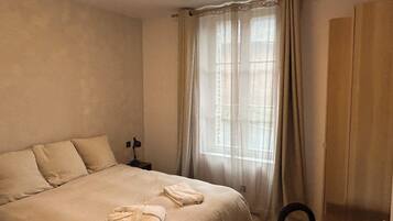 2 dormitorios, tabla de planchar con plancha, wifi y ropa de cama