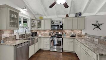 Coffee/tea maker, fridge, microwave, oven
