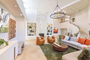 Smart TV, fireplace, books, offices