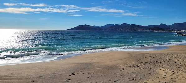 On the beach, beach towels