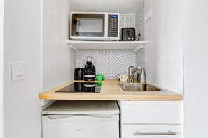 City-studiolejlighed - 1 dobbeltseng - ikke-ryger - byudsigt | Privat køkken | Kaffe-/temaskine, elkedel, højstol, Servietter