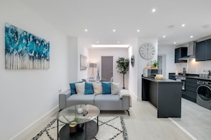 Family Apartment, Patio | Living area | 42-inch Smart TV with digital channels, Netflix, streaming services