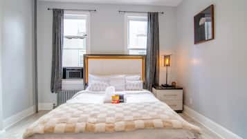 2 habitaciones, caja de seguridad en la habitación y escritorio