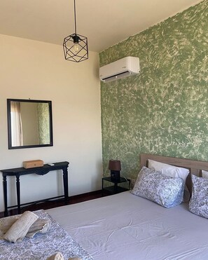 2 chambres, fer et planche à repasser, Wi-Fi, draps fournis