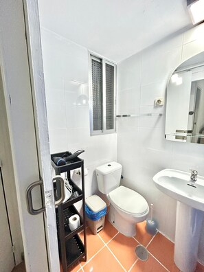 Hair dryer, towels, soap, toilet paper