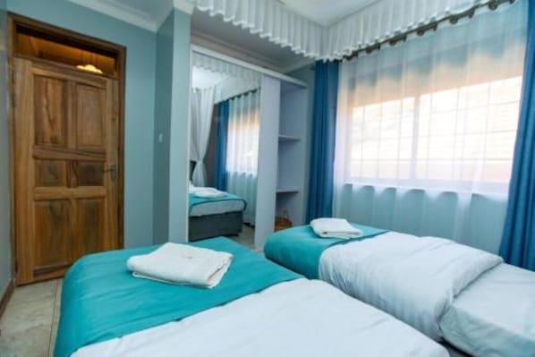 2 chambres, fer et planche à repasser, Wi-Fi, draps fournis