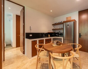 Fridge, microwave, stovetop, coffee/tea maker