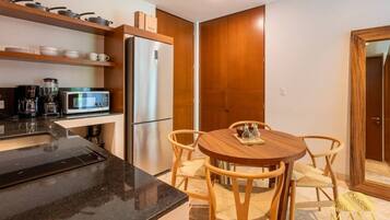 Fridge, microwave, stovetop, coffee/tea maker