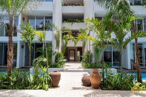 Exterior - NHOA 203A Lux 2BR Condo Pool View in Aldea Zama (Tulum)