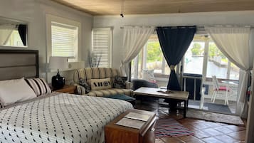 1 bedroom, desk, iron/ironing board, travel crib