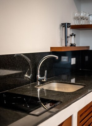 Fridge, microwave, stovetop, coffee/tea maker