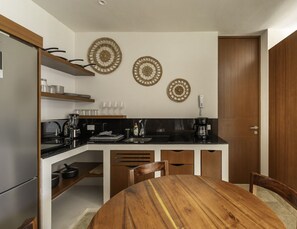 Fridge, microwave, stovetop, coffee/tea maker