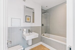 Hair dryer, towels, soap, toilet paper