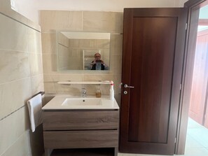 Hair dryer, bidet, towels, soap