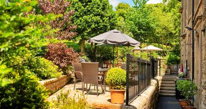 Elegant Duplex in Buxton's Historic Center, No Deposit