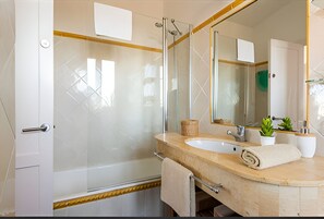 Hair dryer, bidet, towels, soap