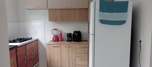 Fridge, stovetop, electric kettle, toaster