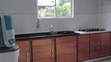 Fridge, stovetop, electric kettle, toaster