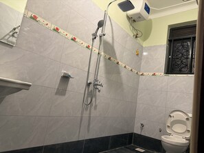Shower, towels, toilet paper