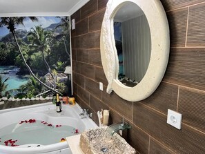 Jetted bath, hair dryer, towels, soap