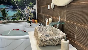 Jetted bath, hair dryer, towels, soap