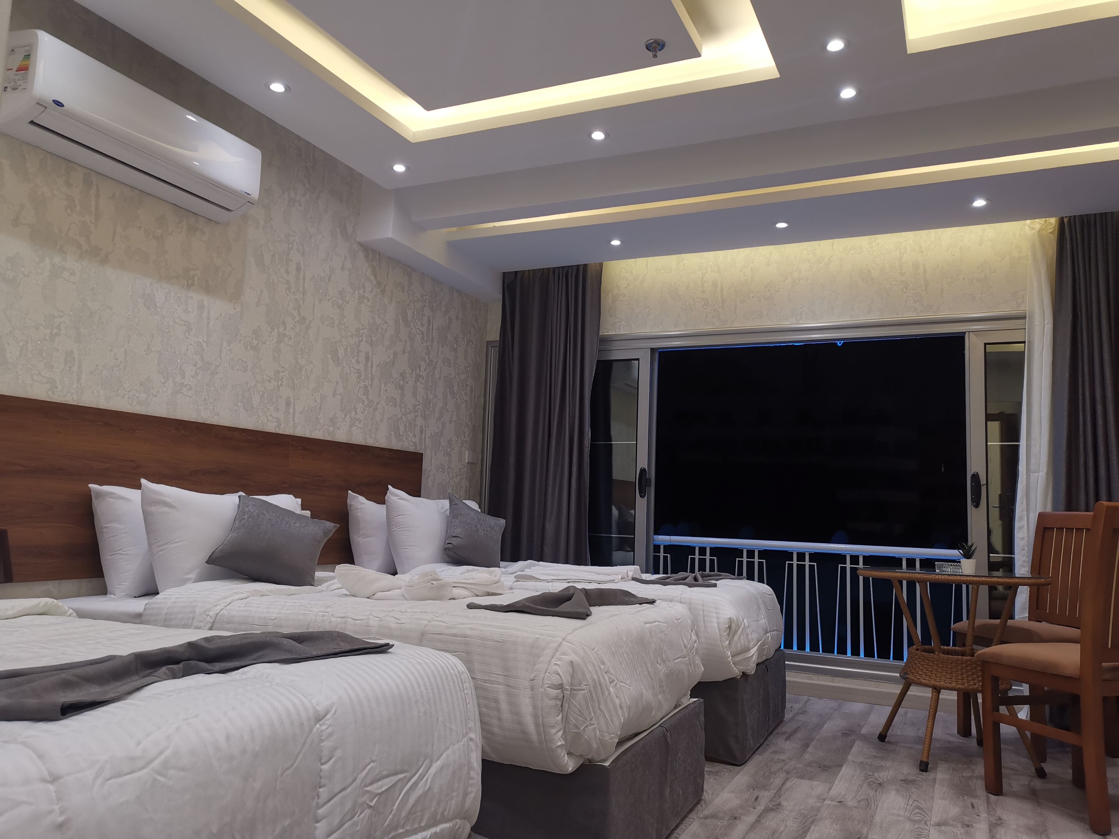 Quarto triplo superior, vista para a cidade | Vista para a cidade