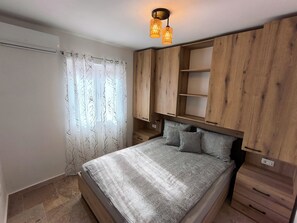 2 chambres, fer et planche à repasser, Wi-Fi, draps fournis