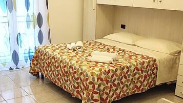 1 chambre, fer et planche Ă repasser, Wi-Fi, draps fournis