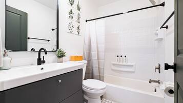 Hair dryer, towels, soap, toilet paper