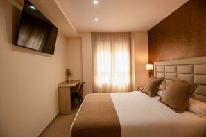 Deluxe kamer | Luxe beddengoed, donsdekens, Select Comfort-bedden
