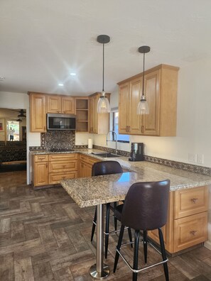 Fridge, microwave, dishwasher, coffee/tea maker