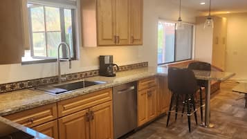 Fridge, microwave, dishwasher, coffee/tea maker