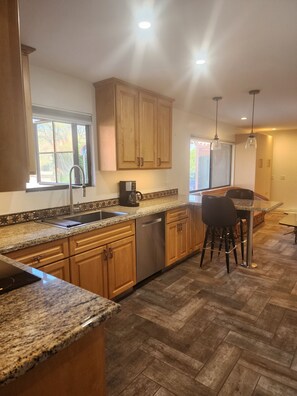 Fridge, microwave, dishwasher, coffee/tea maker
