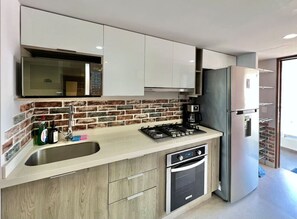 Fridge, microwave, oven, stovetop