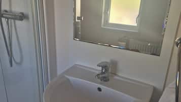 Separate tub and shower, deep soaking tub, hair dryer