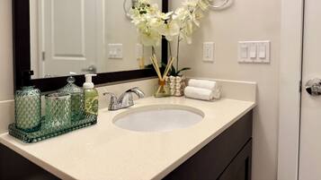 Hair dryer, towels, soap, shampoo