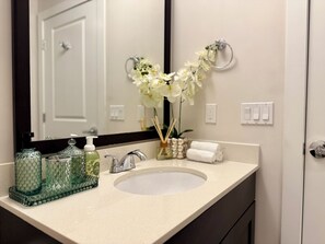 Hair dryer, towels, soap, shampoo
