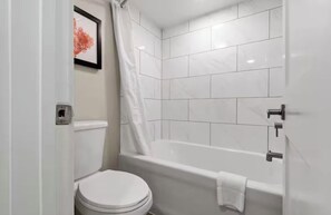 Hair dryer, towels, soap, shampoo