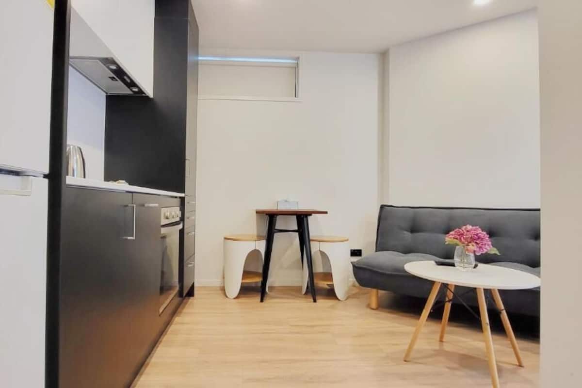 Deluxe appartement | Woonruimte | Een flatscreentelevisie