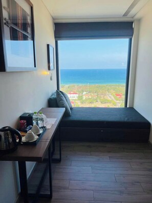 Deluxe Studio Suite, 2 Queen Beds, Balcony, Beach View | In-room safe, desk, laptop workspace, blackout curtains - DaVanie- Apec Mandala Phu Yen (Tuy Hoa)