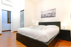 1 bedroom, desk, iron/ironing board, travel crib