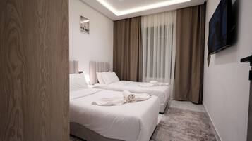 Appartement Luxe, 3 chambres, vue ville | 3 chambres, literie de qualité supérieure
