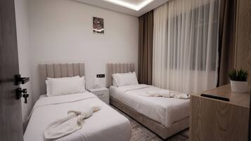 Deluxe Apartment, 2 Bedrooms, City View | Premium bedding, in-room safe, free cots/infant beds, free WiFi
