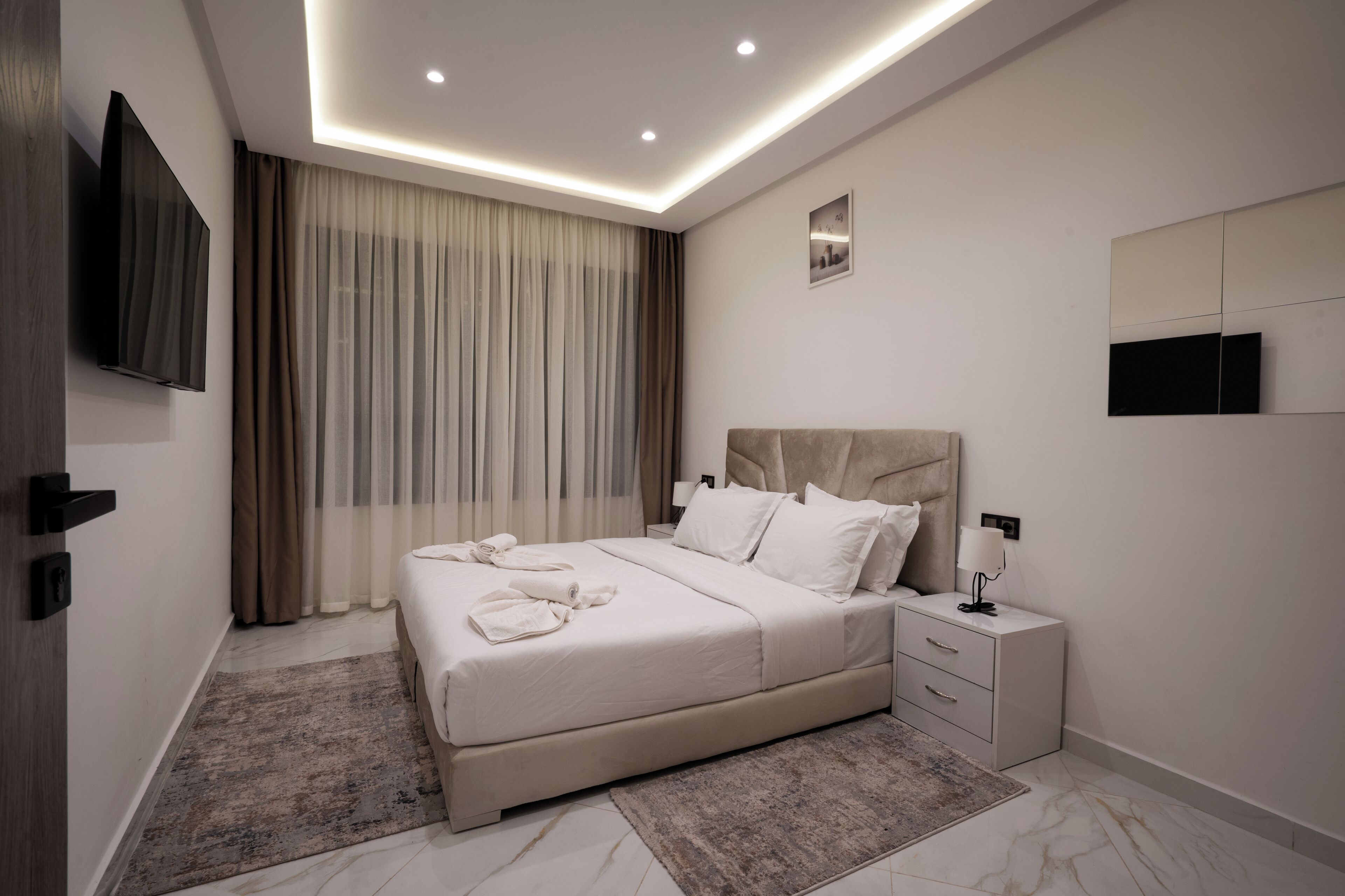 华丽公寓, 2 间卧室, 城市景观 | 起居区 | 45-英寸纯平电视（配备卫星频道）、Netflix、流媒体服务