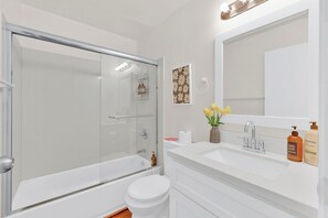 Hair dryer, towels, soap, shampoo
