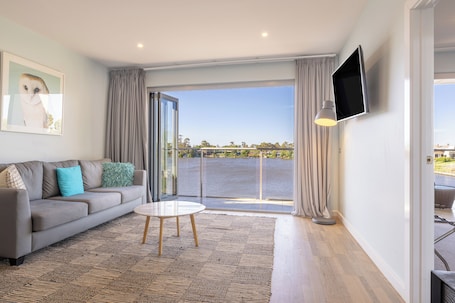 Executive suite | Desk, laptop workspace, blackout drapes, iron/ironing board