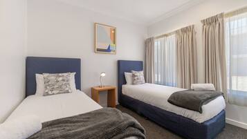 Standard Family Room | Desk, laptop workspace, blackout drapes, iron/ironing board